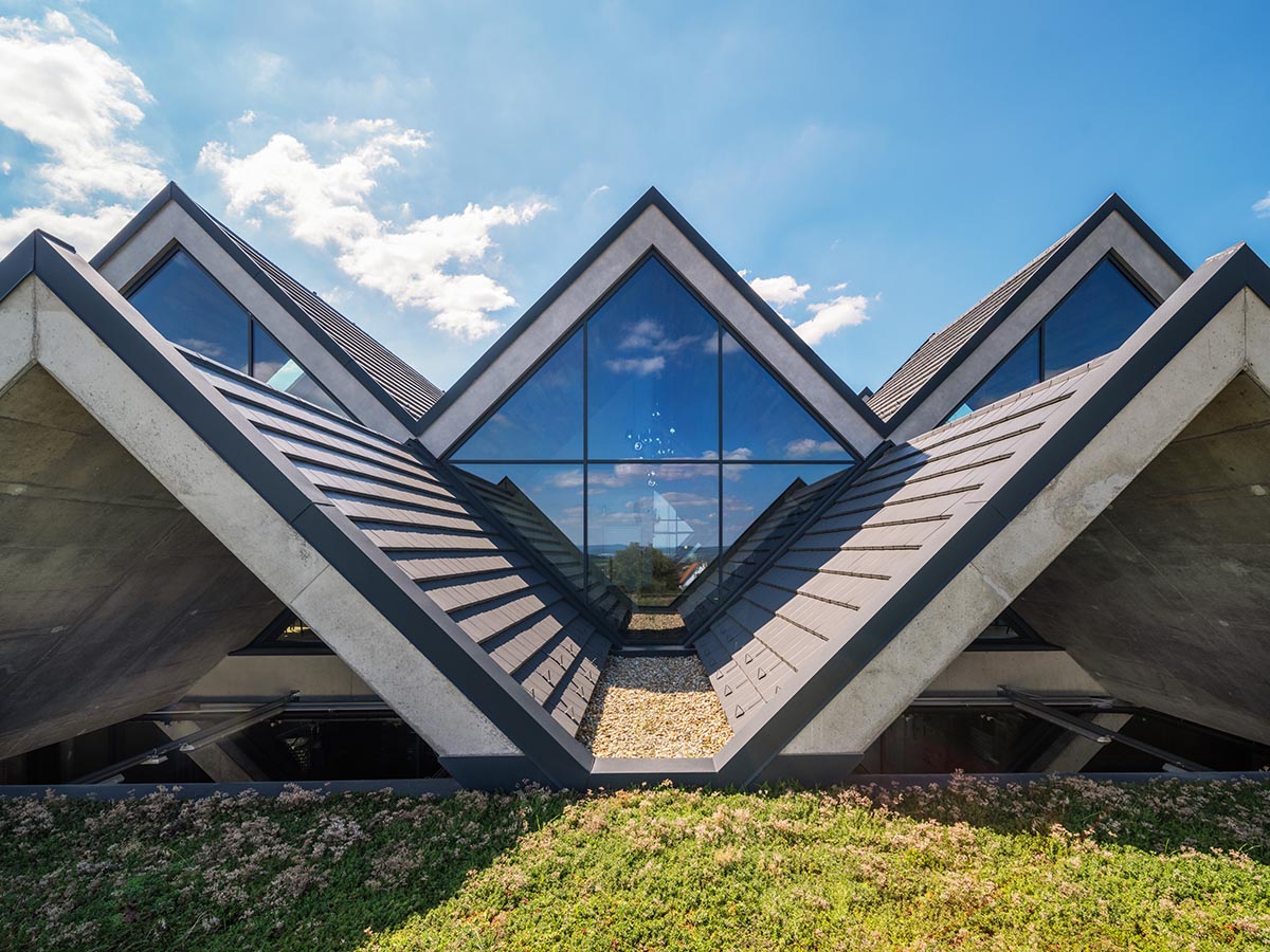 BORD completes cider production facility with rhombus-shaped tunnel-like volumes in Hungary
