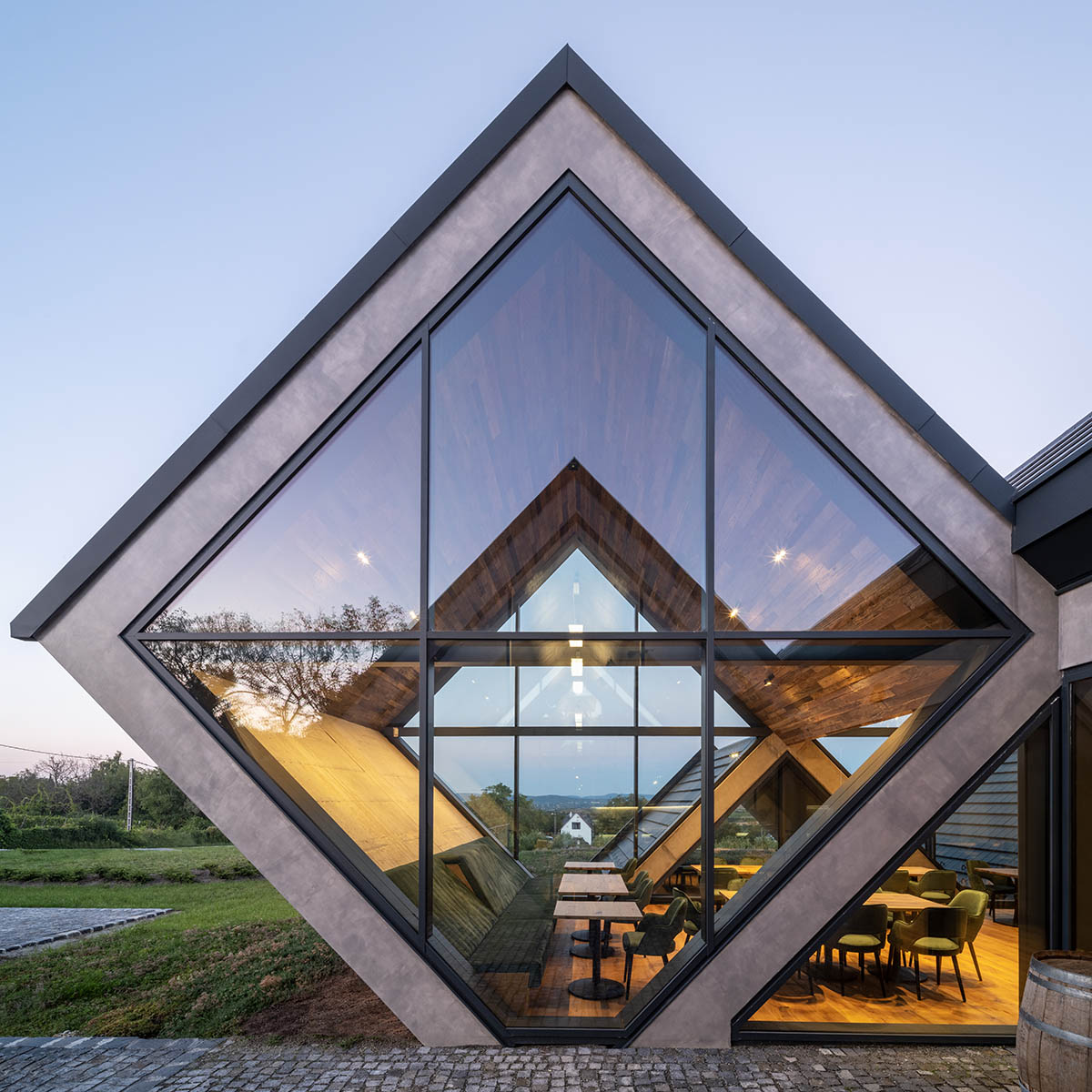 BORD completes cider production facility with rhombus-shaped tunnel-like volumes in Hungary