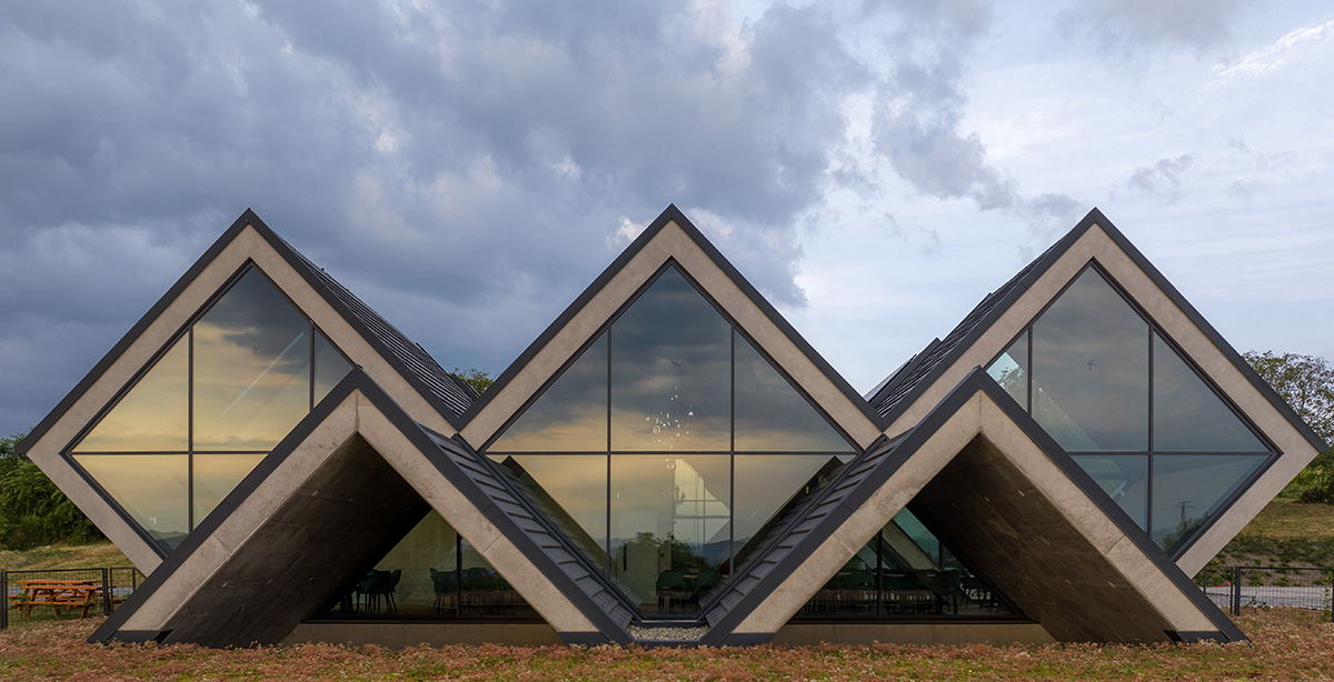 BORD completes cider production facility with rhombus-shaped tunnel-like volumes in Hungary