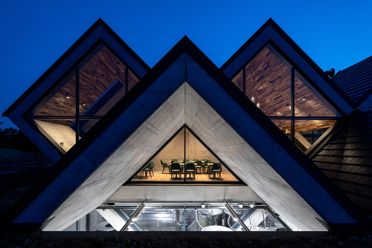 BORD completes cider production facility with rhombus-shaped tunnel-like volumes in Hungary