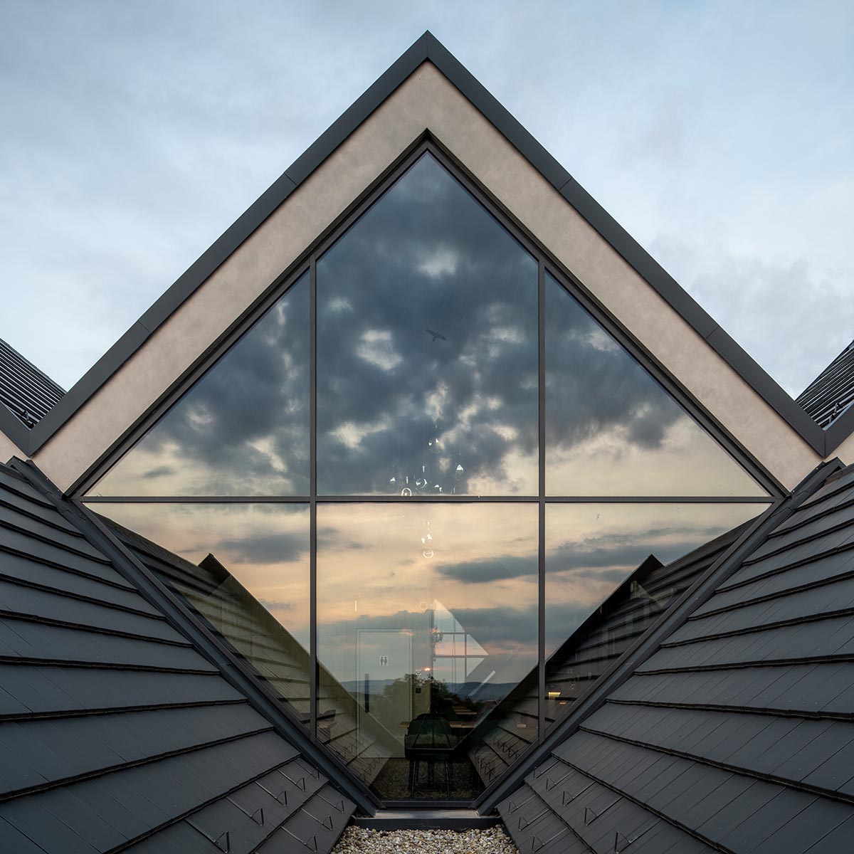 BORD completes cider production facility with rhombus-shaped tunnel-like volumes in Hungary