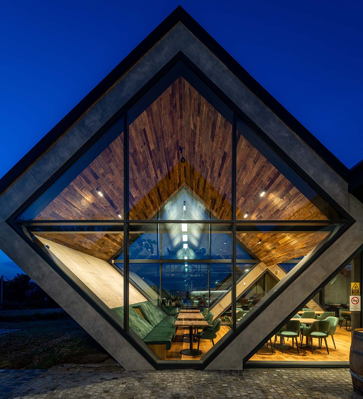 BORD completes cider production facility with rhombus-shaped tunnel-like volumes in Hungary