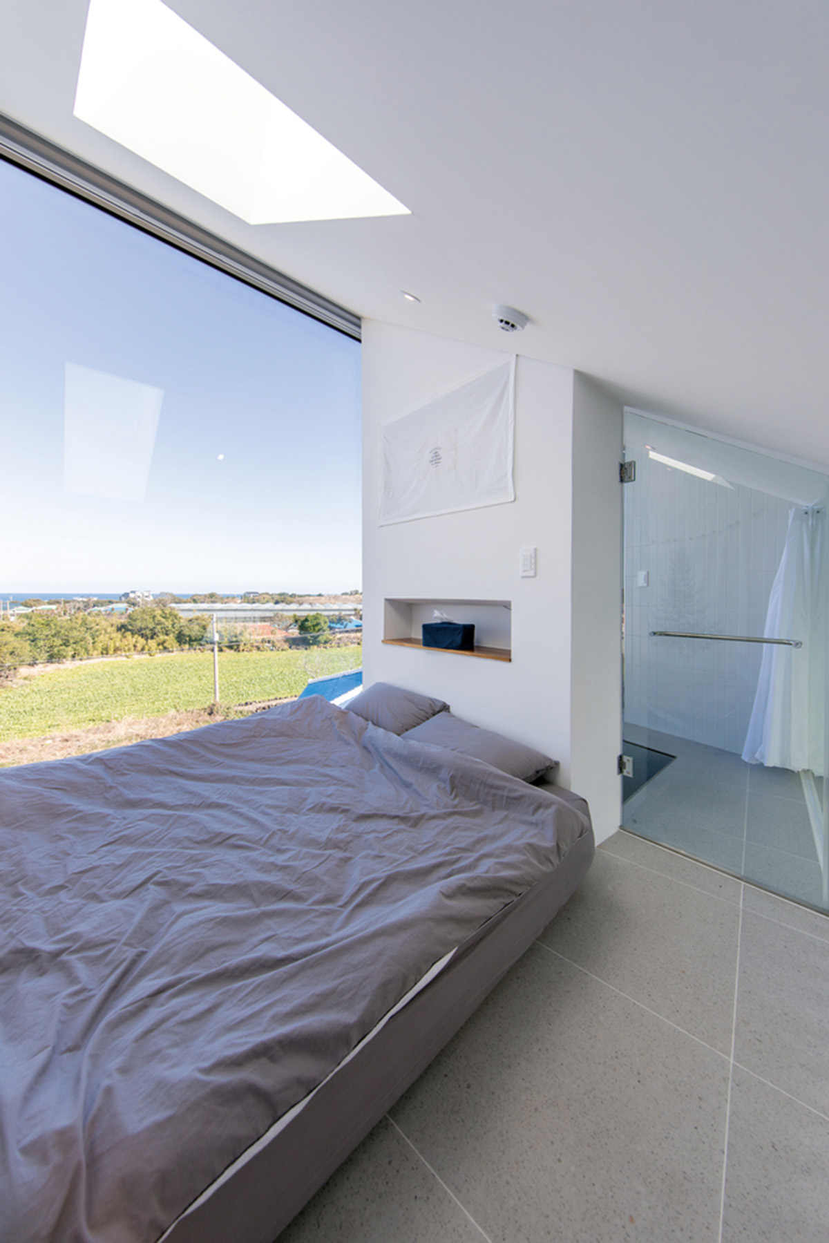 Formative Architects divides house into three volumes for additional guest house in South Korea