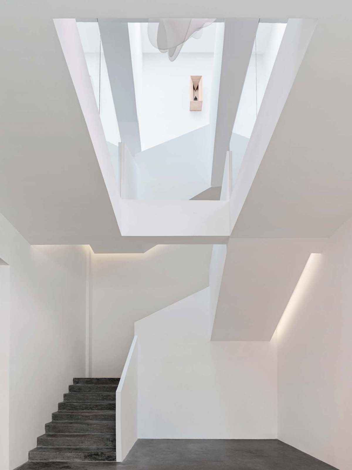 Ladder-Like sandalwood yellow volumes form Buddha artist's exhibition space and studio in China