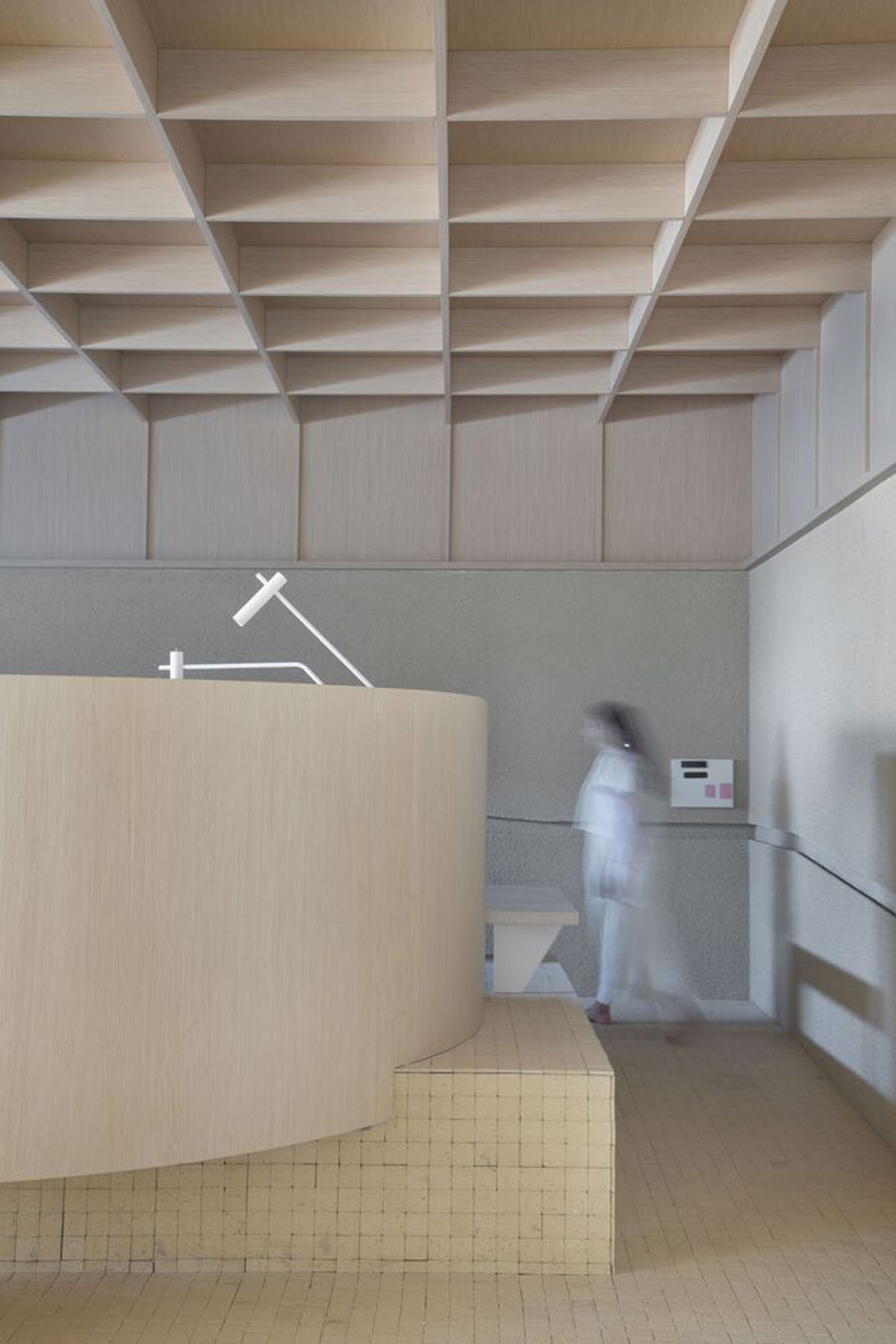 Organic shapes and bulbous furnitures form interiors of Olaria House by NJ+ Arquitetos Associados 