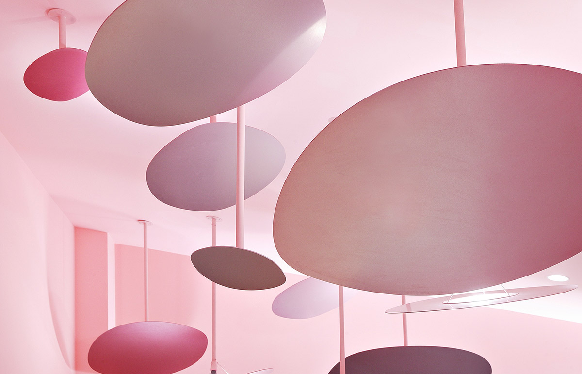 Collective B's beauty shop in South Korea features pink-hued colors and layered walls