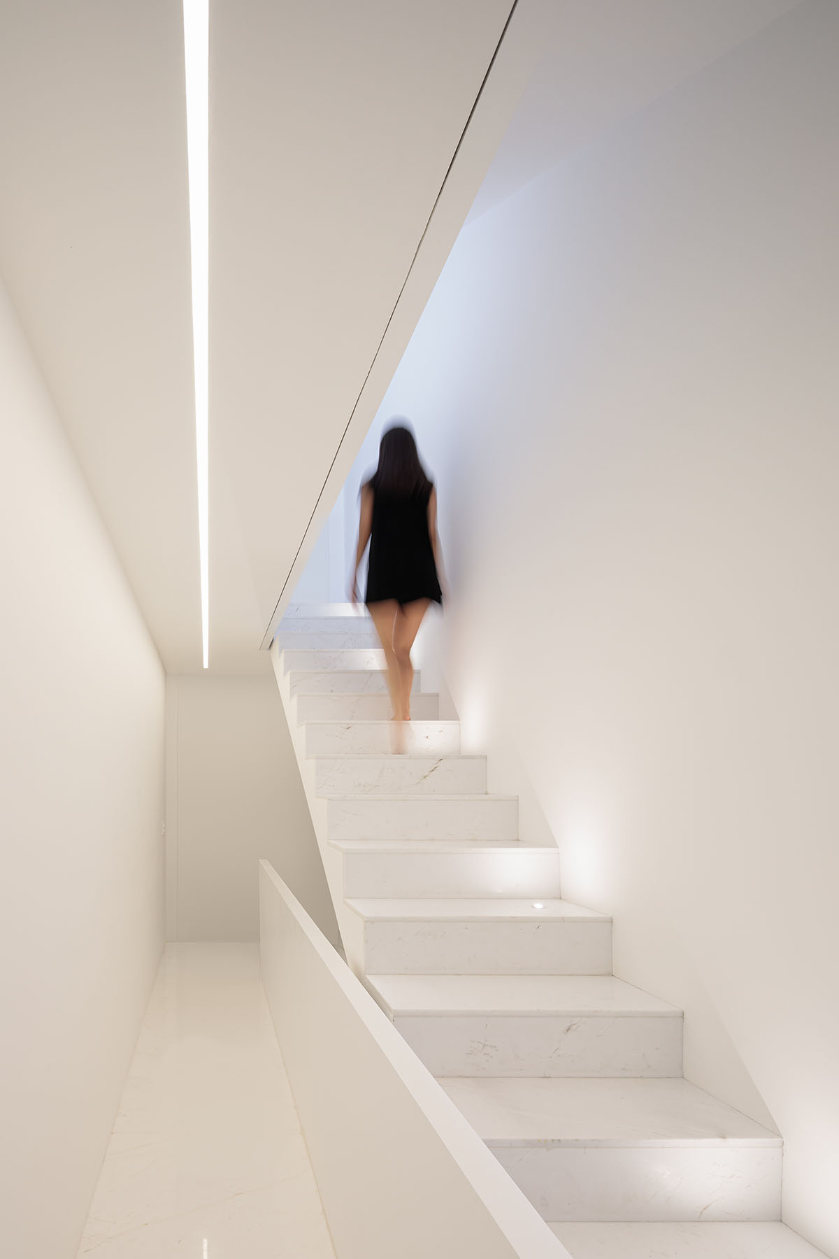 HW Studio adds lacework-looking façade to all-white house in Mexico
