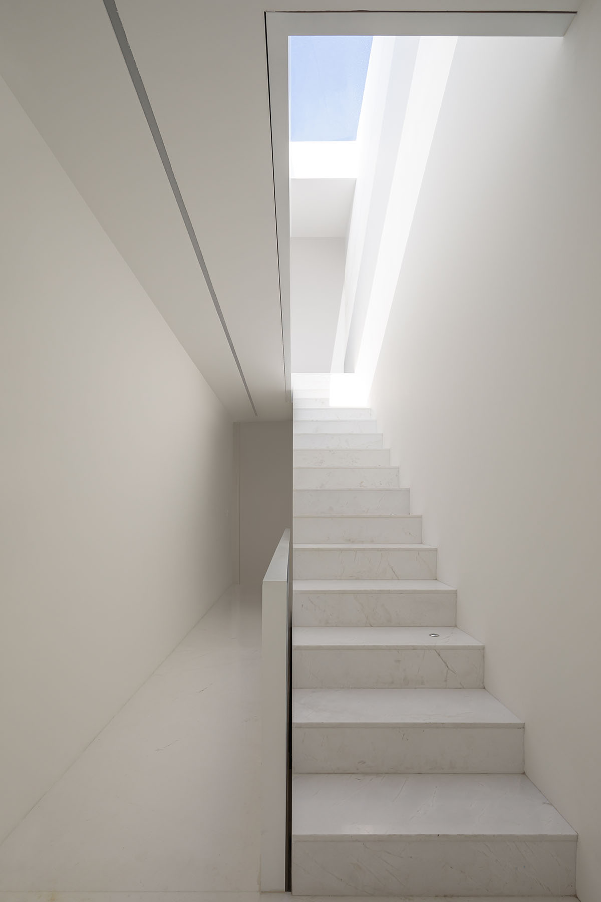 HW Studio adds lacework-looking façade to all-white house in Mexico