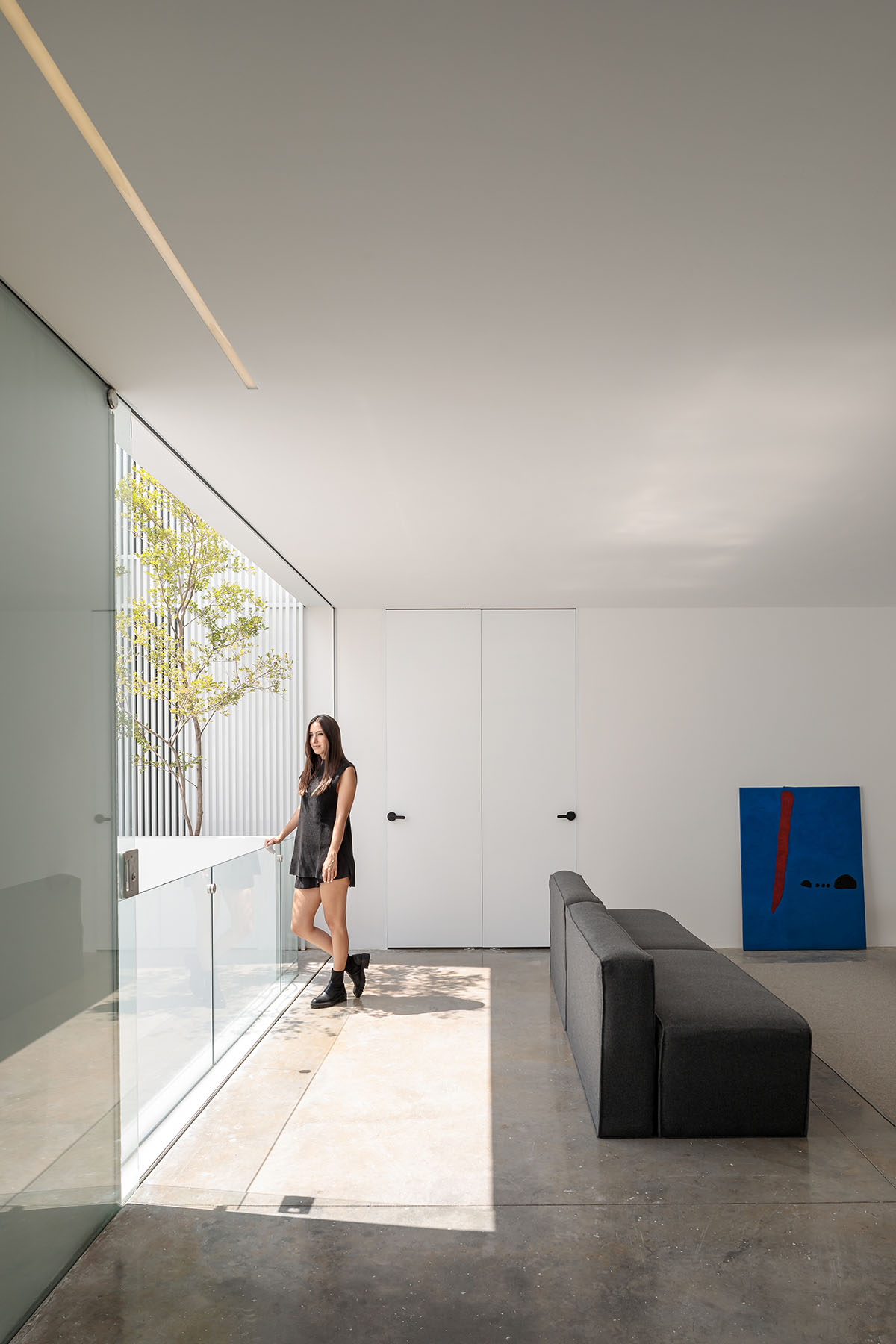 HW Studio adds lacework-looking façade to all-white house in Mexico