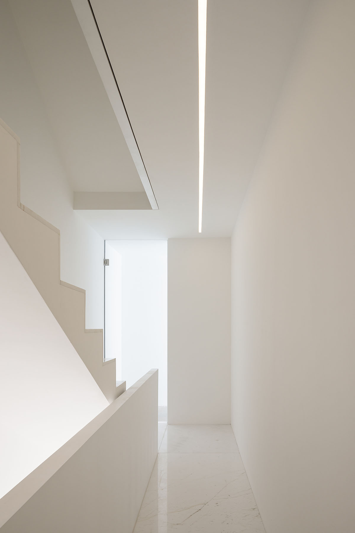 HW Studio adds lacework-looking façade to all-white house in Mexico