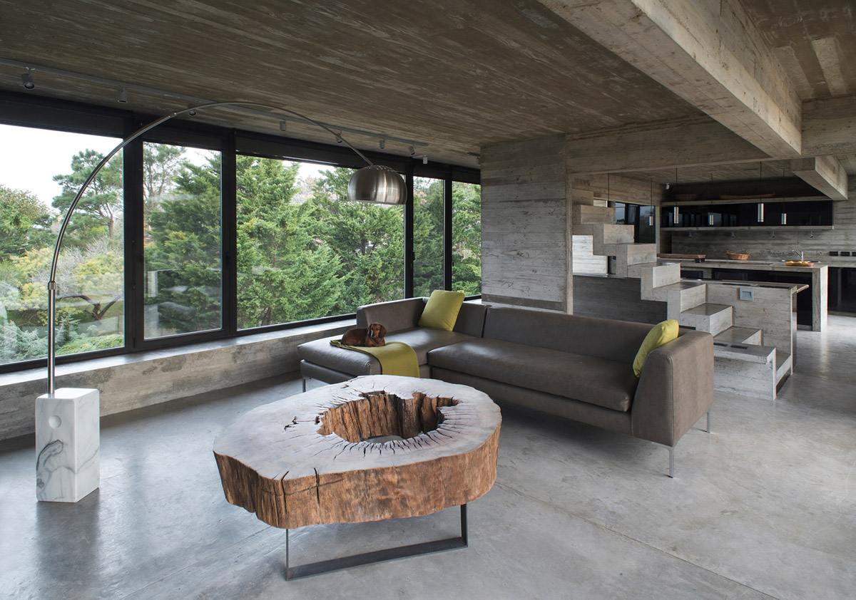 Luciano Kruk uses hanging volume for a vacation house supported by triangular column in Argentina