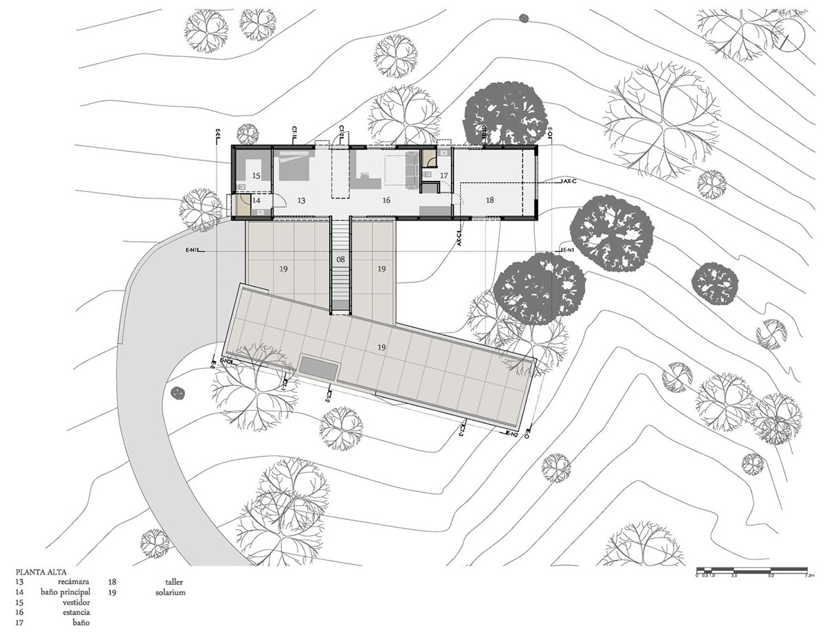 P+0 Arquitectura designs residence mixed with concrete and stone volumes on a complex terrain