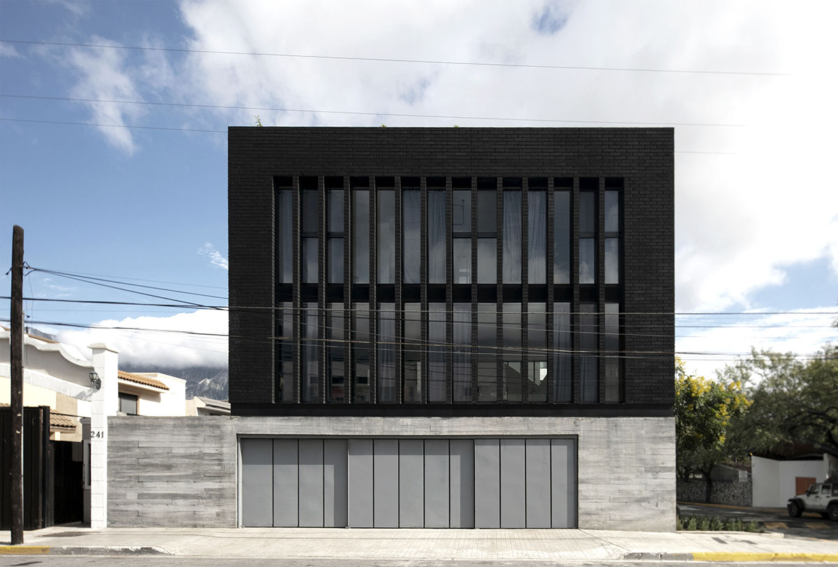 S-AR creates industrial feeling for this house with dark facade in Nuevo León, México