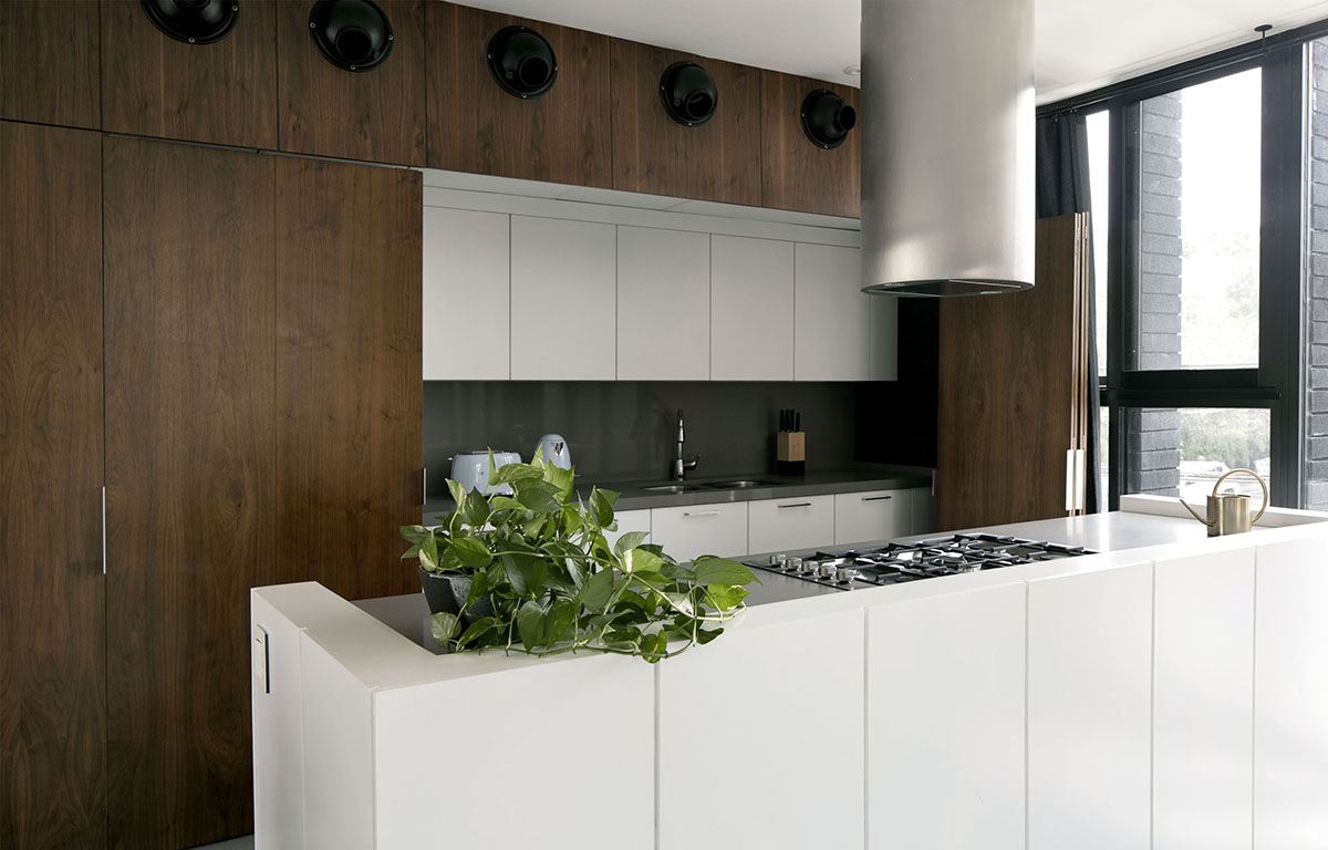 S-AR creates industrial feeling for this house with dark facade in Nuevo León, México