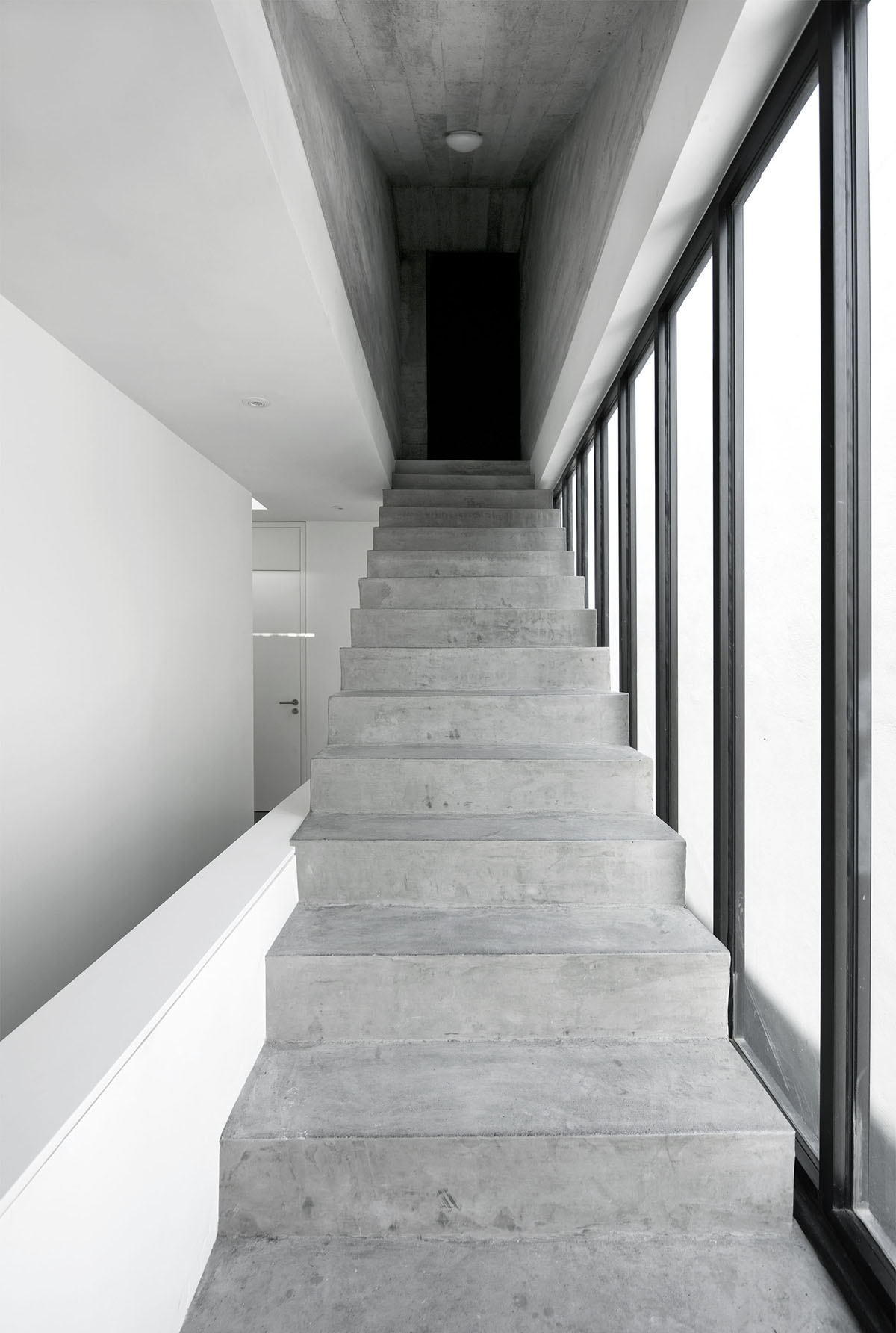 S-AR creates industrial feeling for this house with dark facade in Nuevo León, México