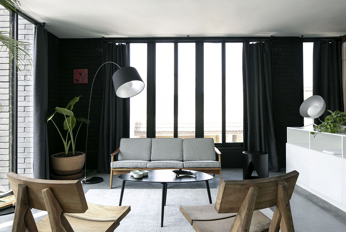 S-AR creates industrial feeling for this house with dark facade in Nuevo León, México