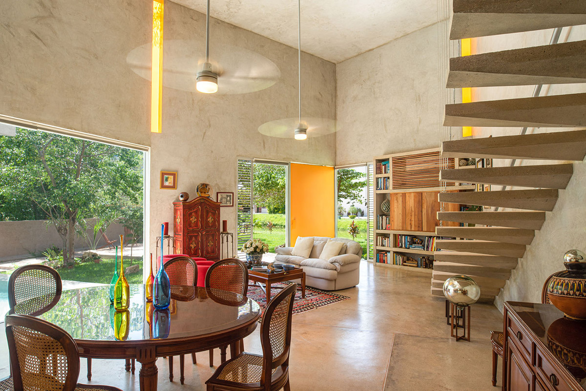 Natural-toned detached house by TACO features dynamic open spaces and backyards in Mexico
