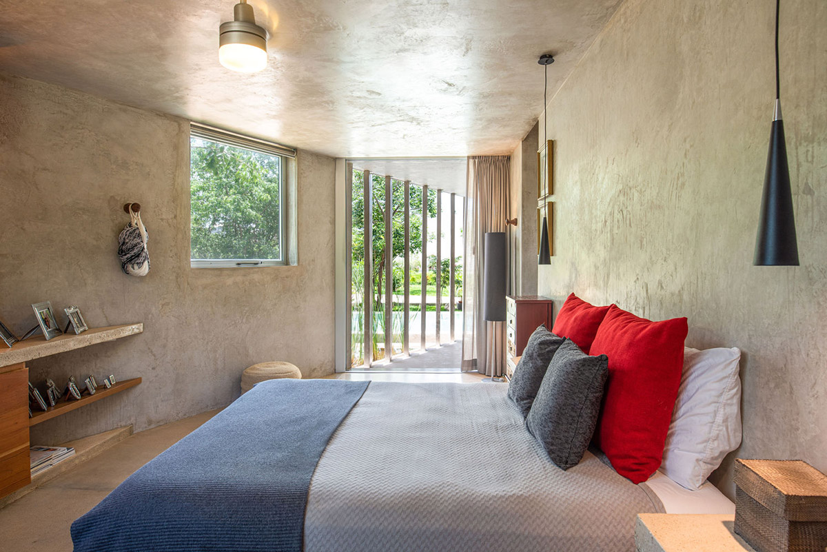 Natural-toned detached house by TACO features dynamic open spaces and backyards in Mexico