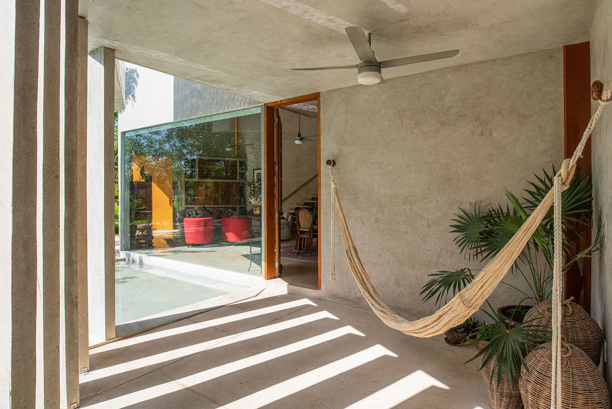 Natural-toned detached house by TACO features dynamic open spaces and backyards in Mexico