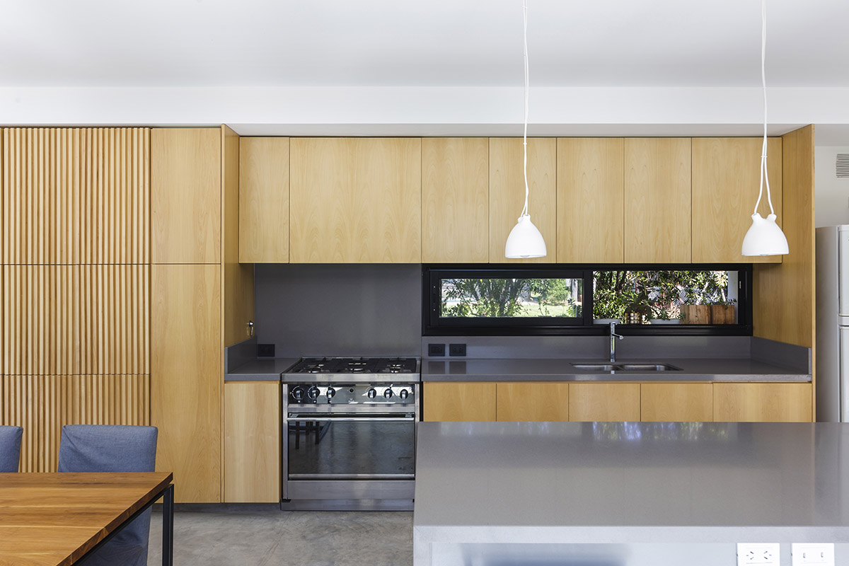 Nomade Architecture completes family house enveloped by white brick walls in Argentina