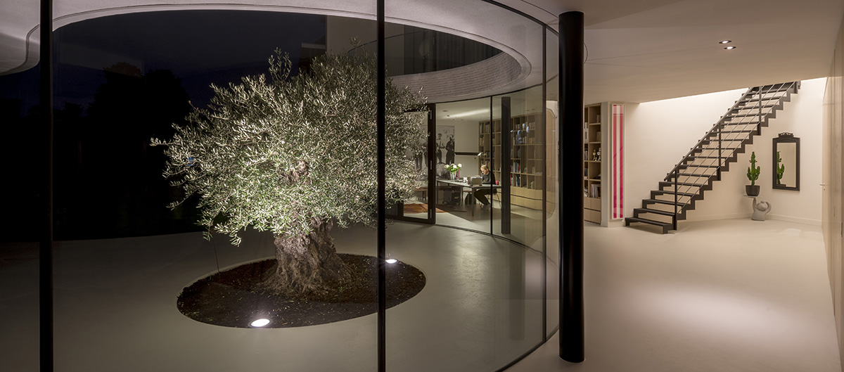 MVRDV completes Casa Kwantes house with fluid glass walls in Rotterdam