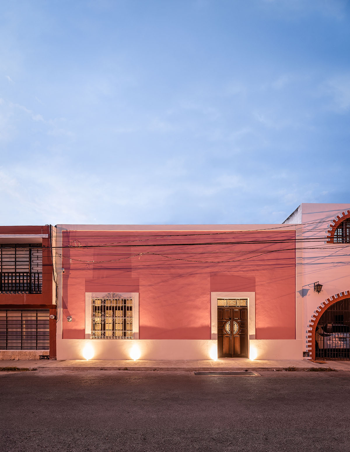 Workshop, Diseño y Construcción combines historic elements with Mexican pink in Casa Maca 