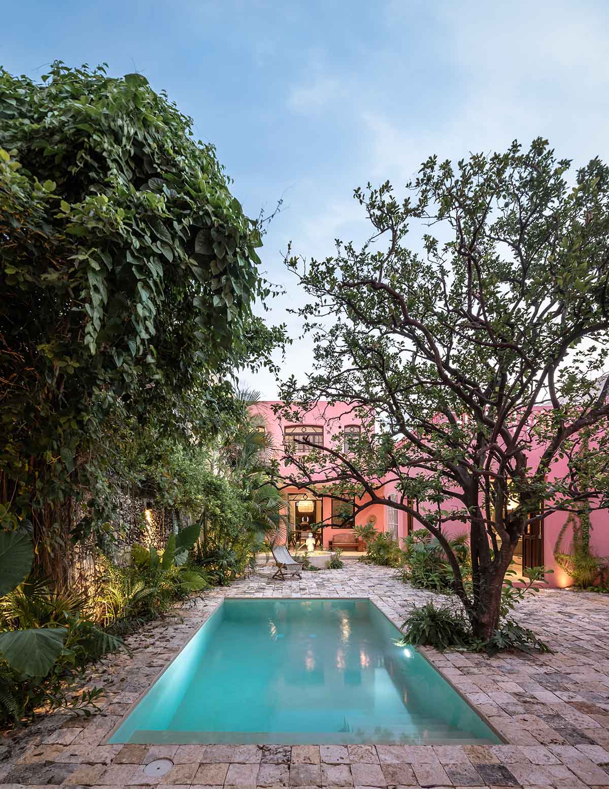 Workshop, Diseño y Construcción combines historic elements with Mexican pink in Casa Maca 