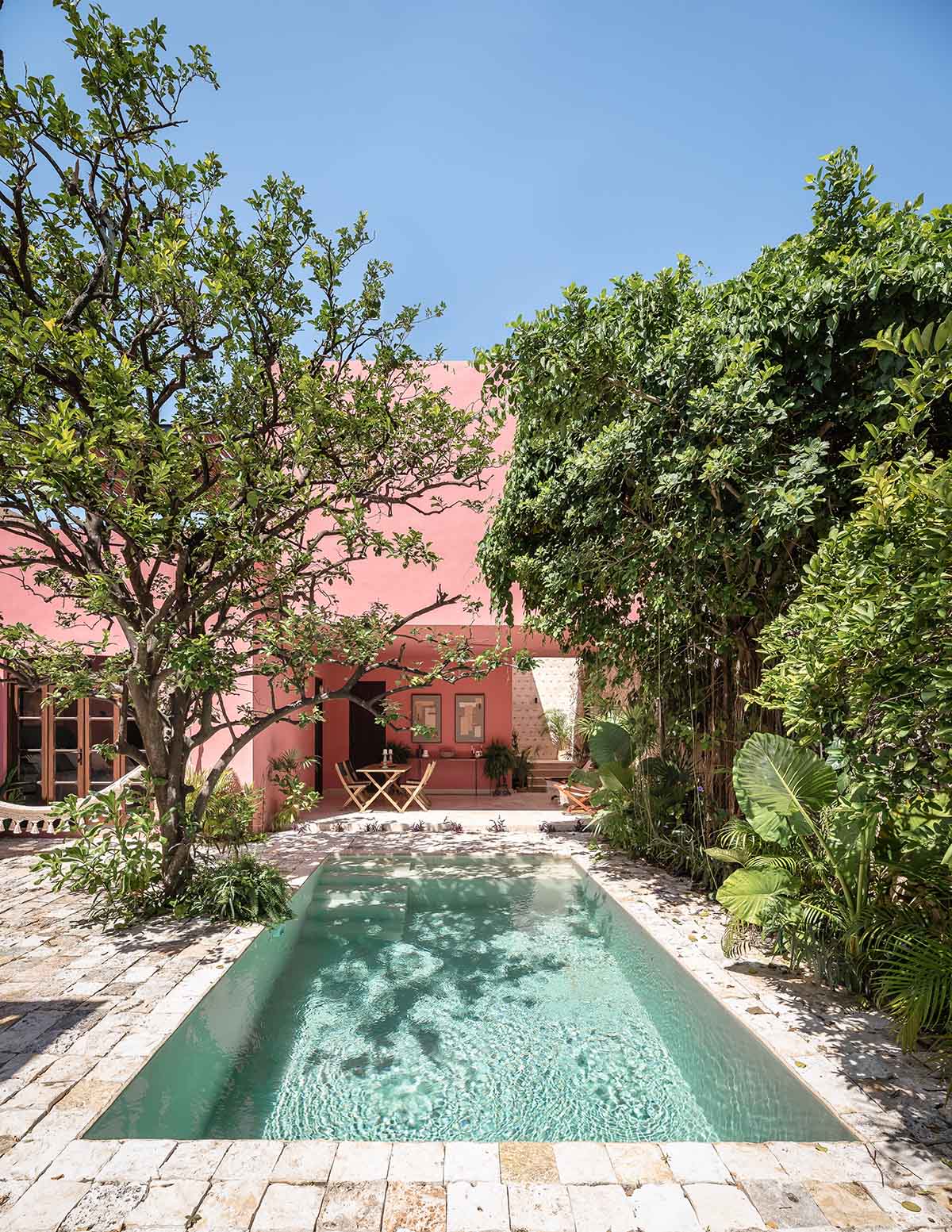Workshop, Diseño y Construcción combines historic elements with Mexican pink in Casa Maca 