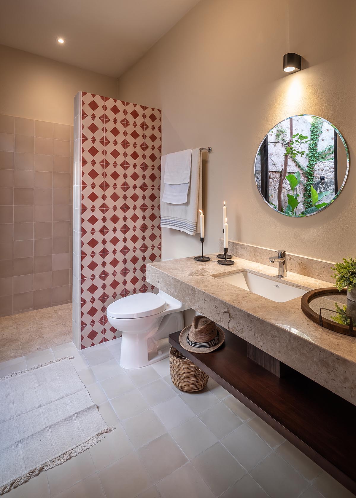 Workshop, Diseño y Construcción combines historic elements with Mexican pink in Casa Maca 