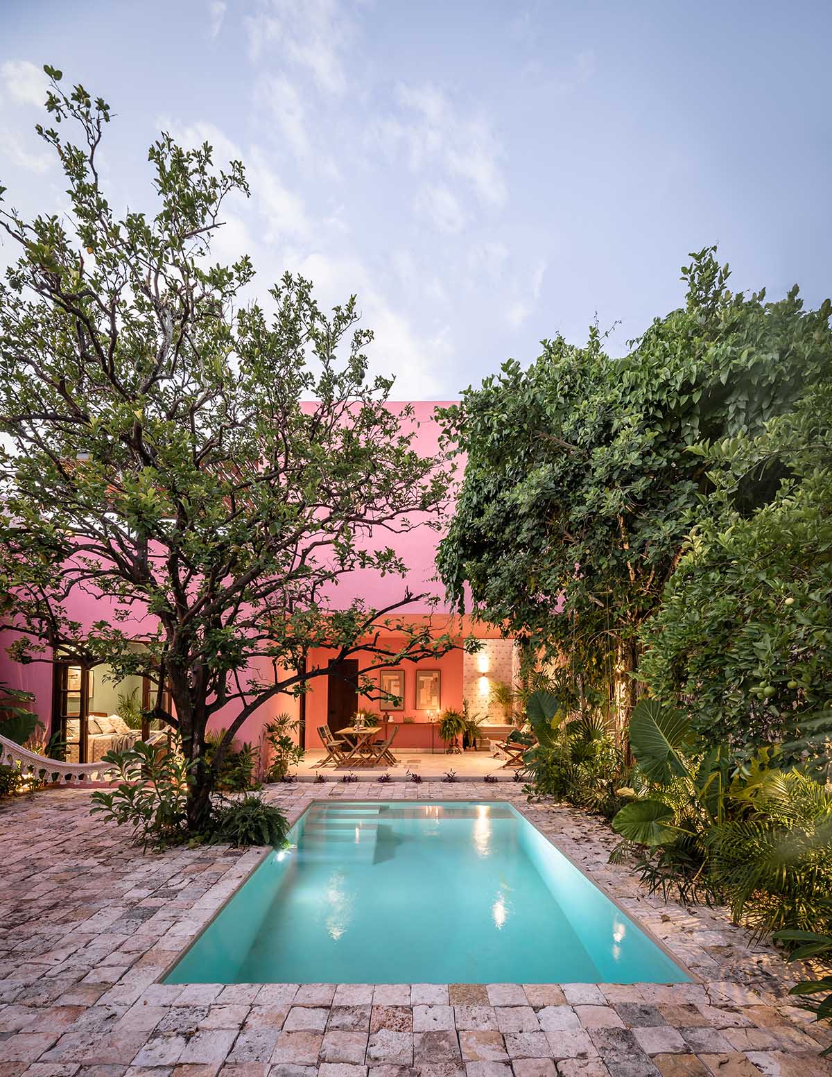 Workshop, Diseño y Construcción combines historic elements with Mexican pink in Casa Maca 