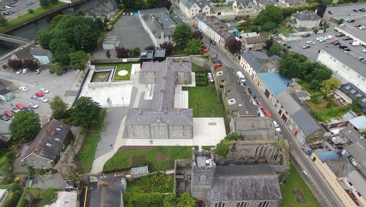 Mccullough Mulvin Architects adds two metal-clad volumes to convert former almshouse into art gallery
