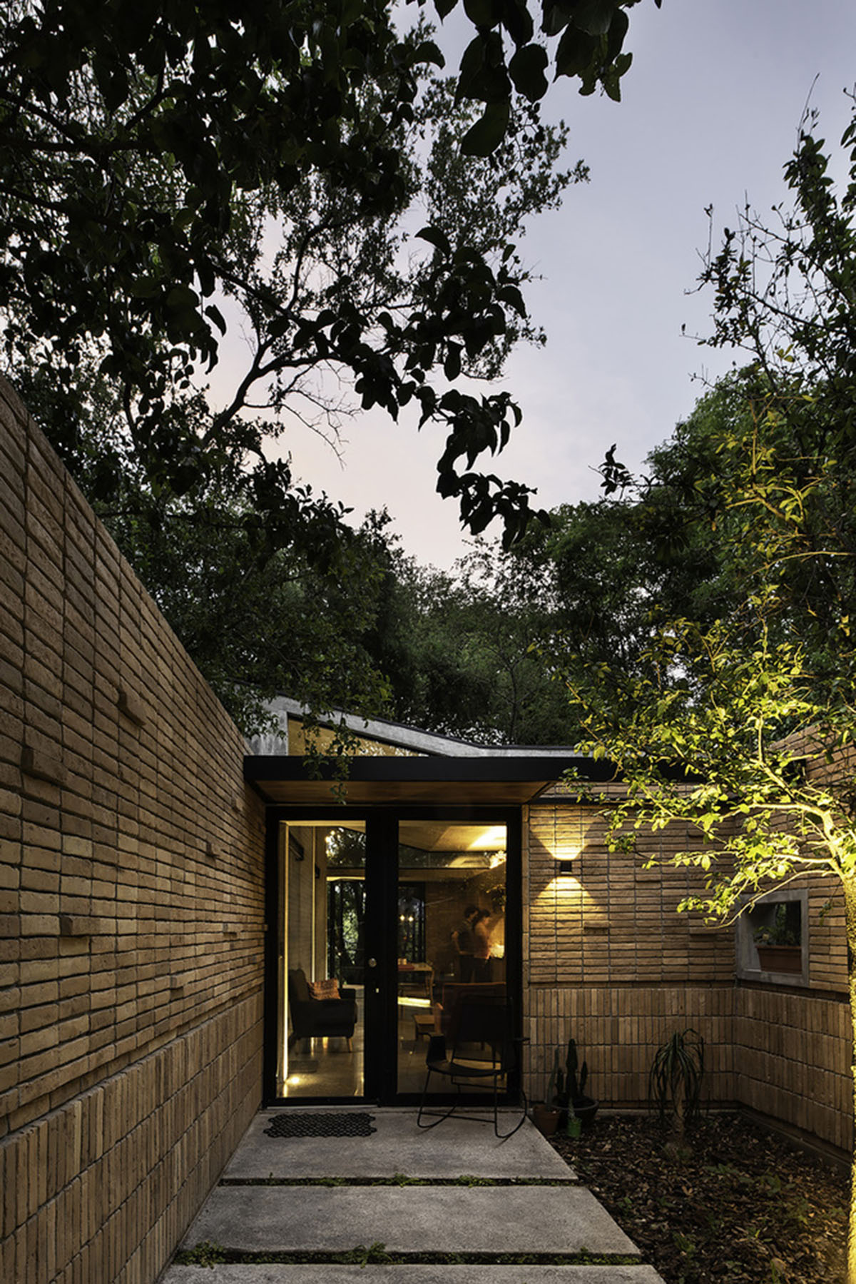 WEYES Estudio built single family house divided into four pavilions blended with the forest in Mexico