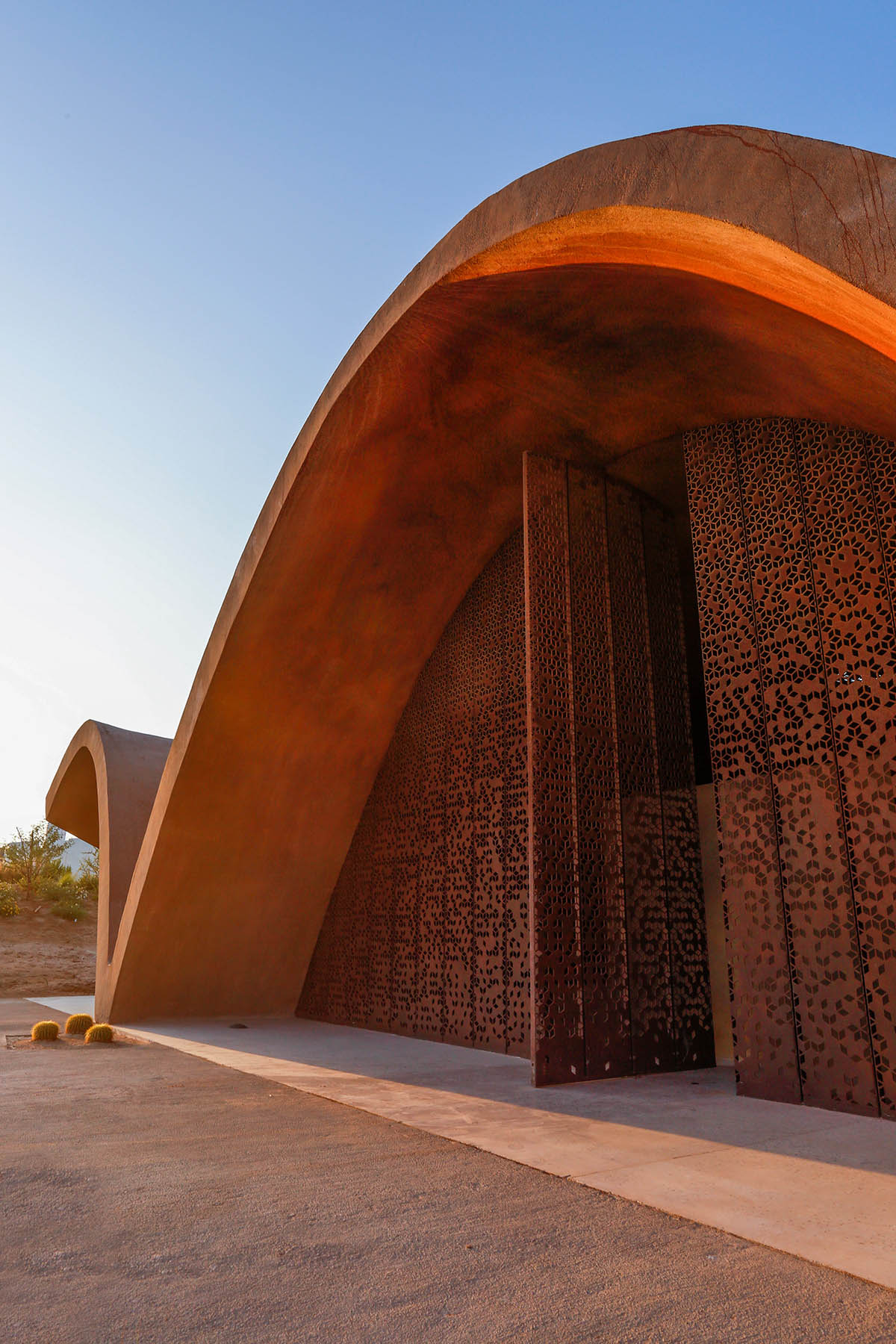 Oppenheim Architecture completes Ayla Golf Academy with wavy roofs in deserted landscape of Jordan