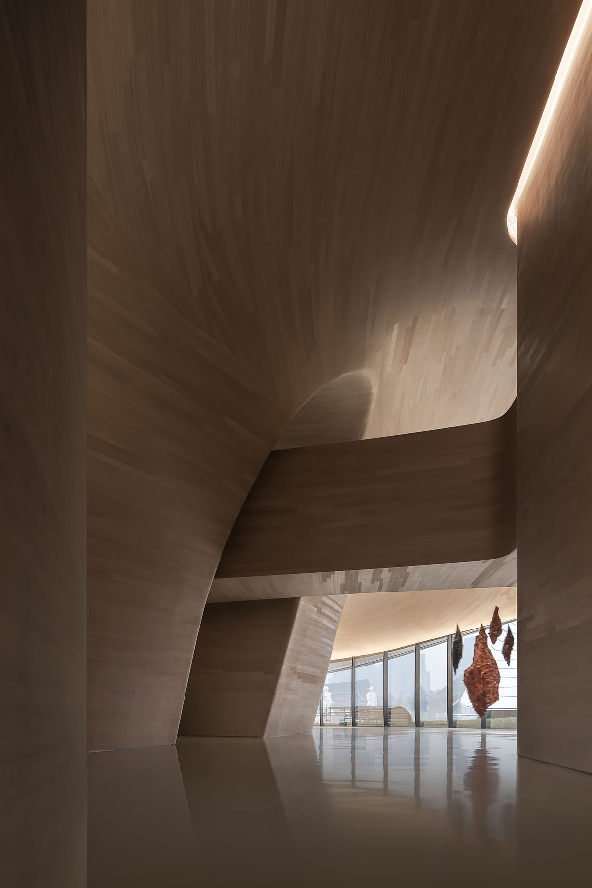 Art museum by CSD Design features curvaceous volume and roof inspired by the flower of Chengdu