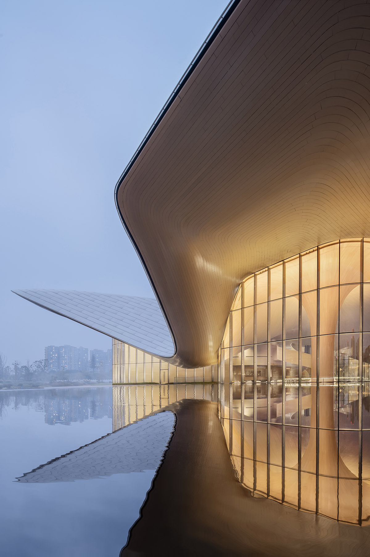 Art Museum By Csd Design Features Curvaceous Volume And Roof Inspired