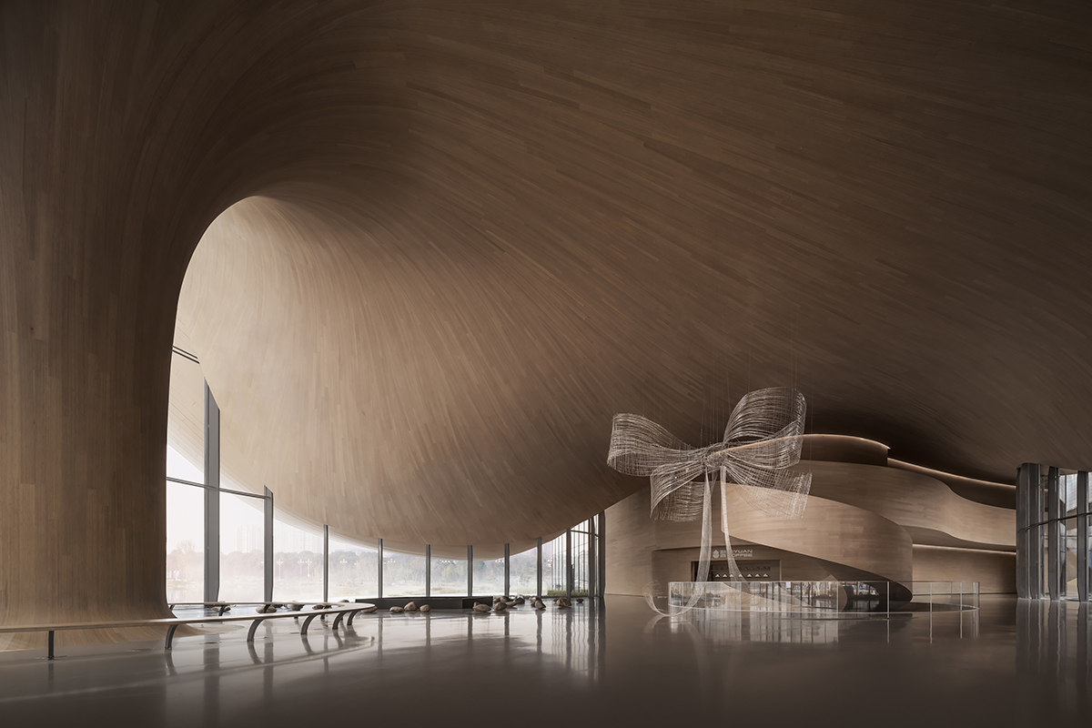 Art museum by CSD Design features curvaceous volume and roof inspired by the flower of Chengdu