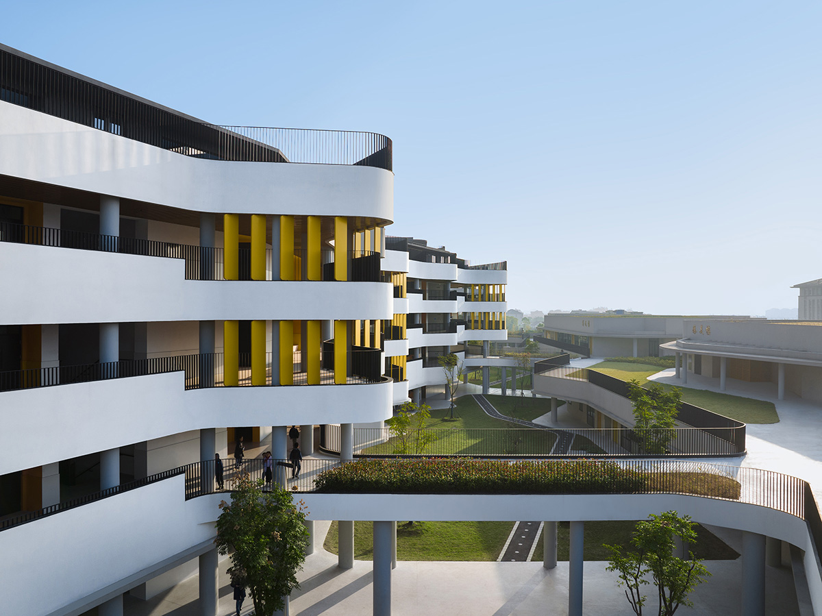 BAU Brearley Architects+Urbanists completes Chonggu Experimental School with curved slabs 