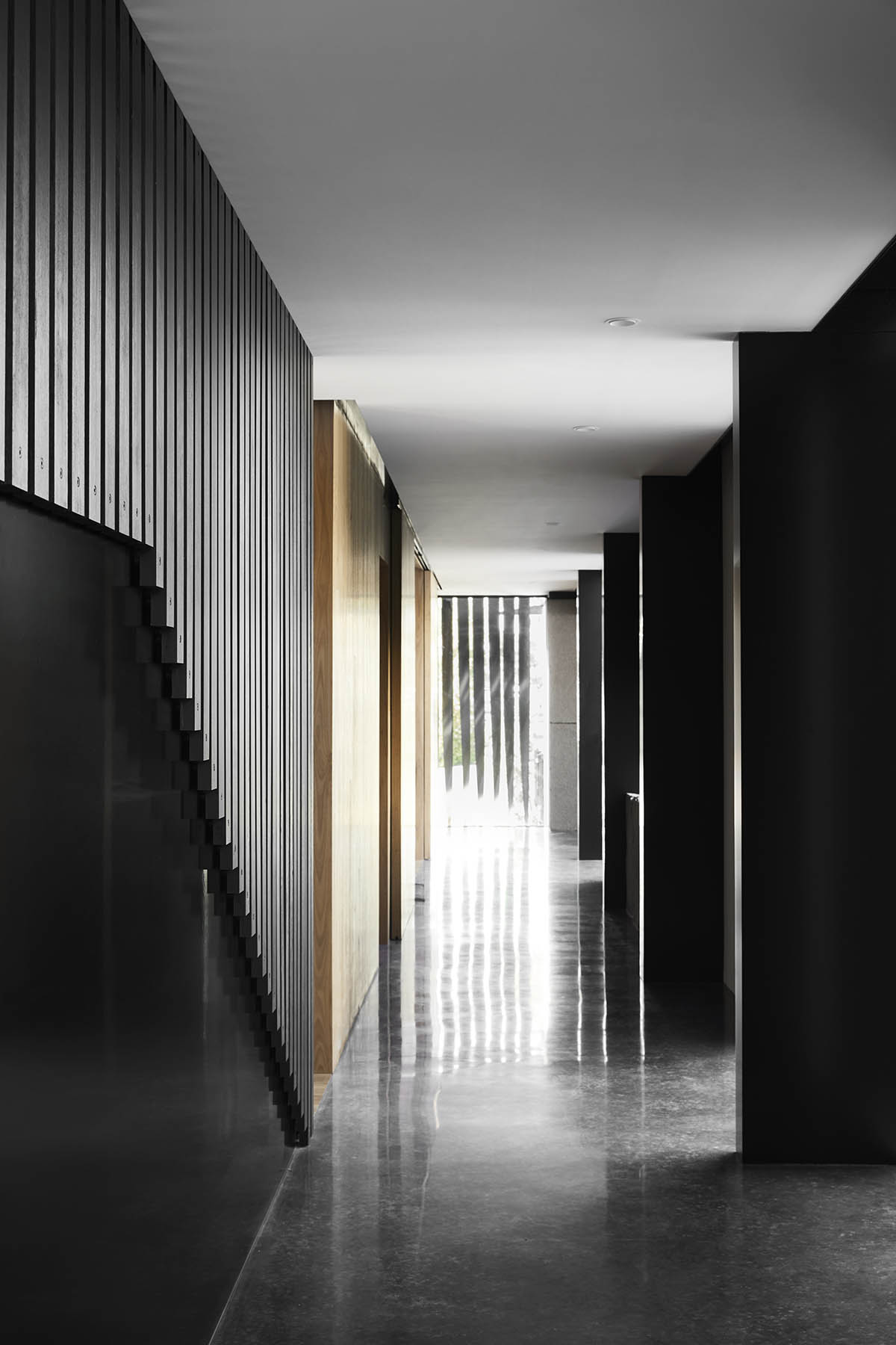 Splinter Society Architecture clads Cornerstone House with blackened timber slats in Australia