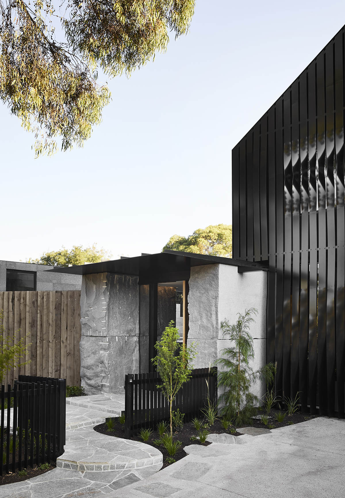Splinter Society Architecture clads Cornerstone House with blackened timber slats in Australia
