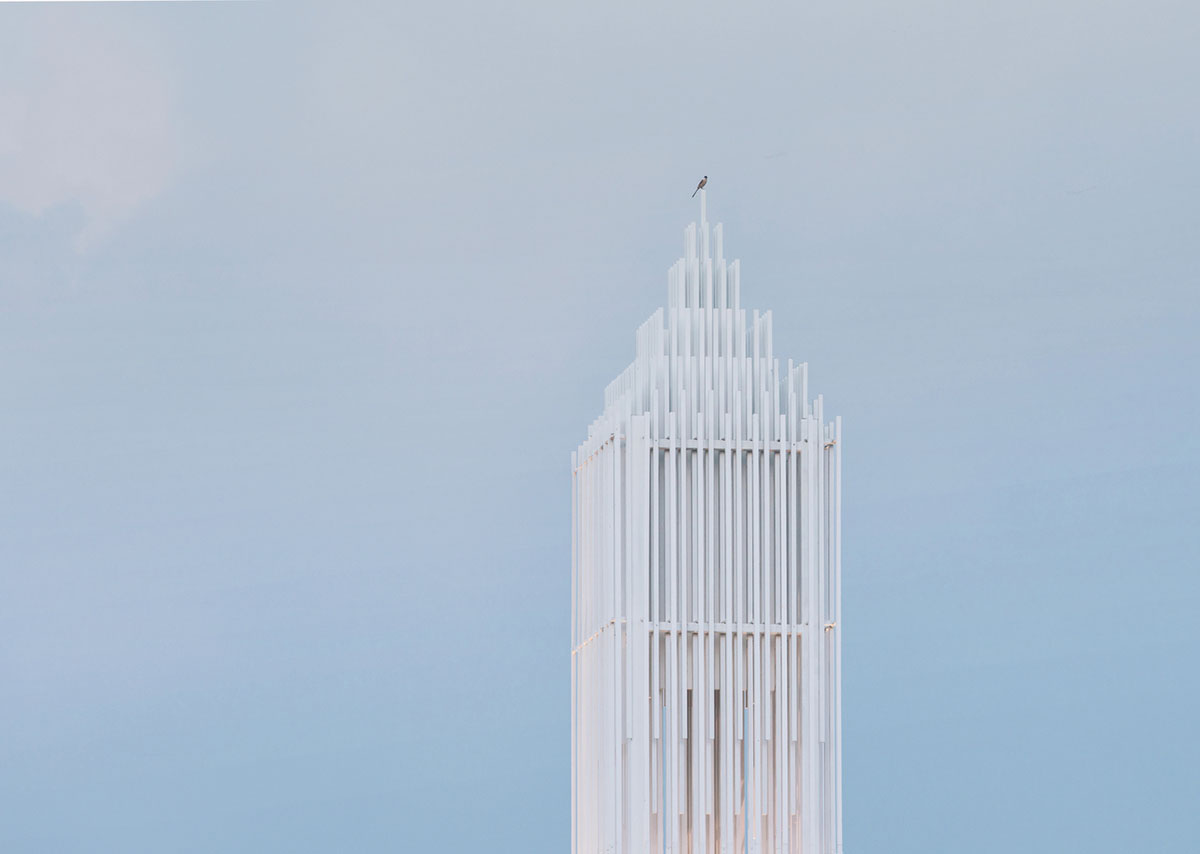 A church made of thousands of white thin beams looks like suspended in the air in lavender field