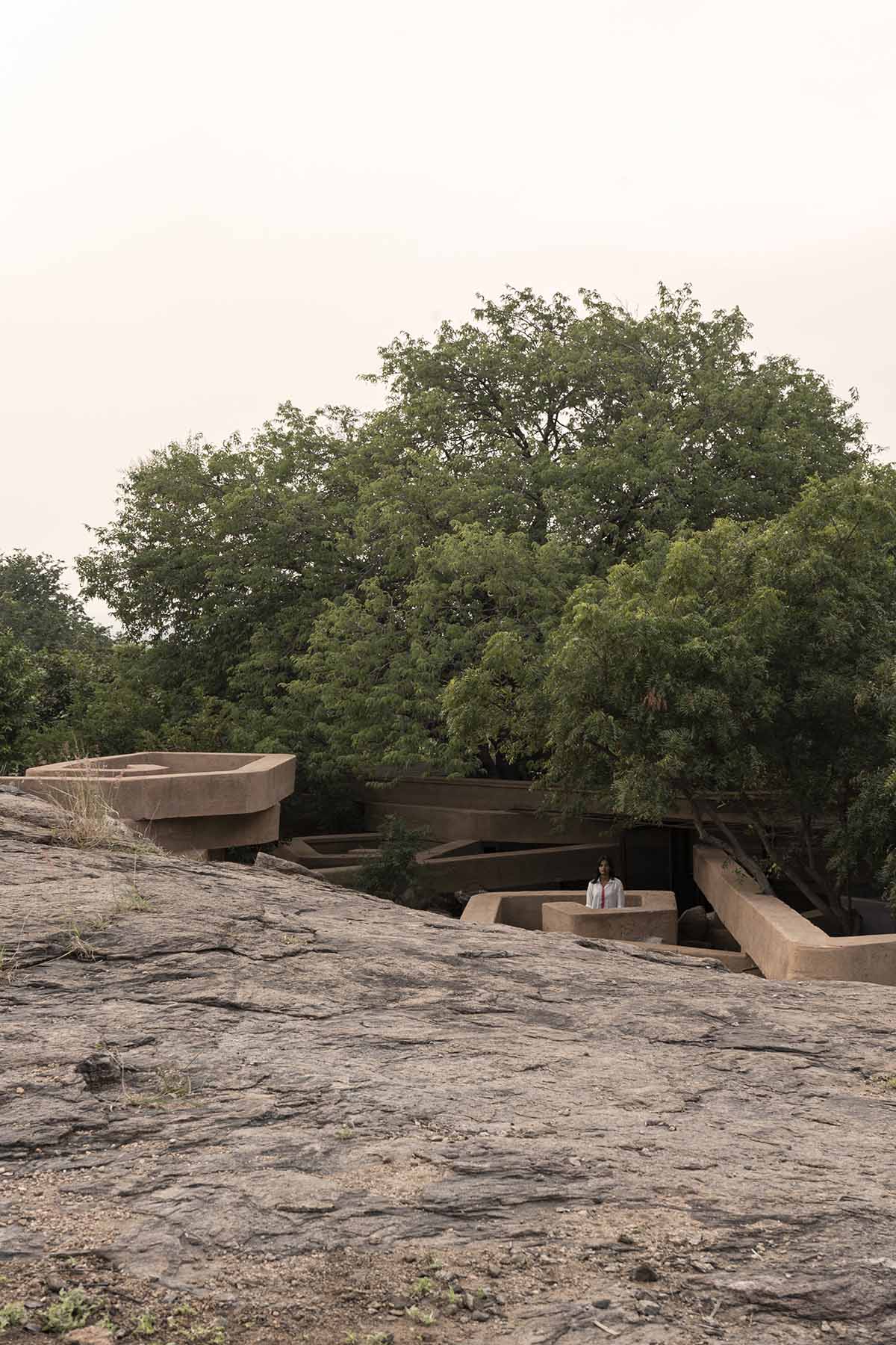 Wallmakers reveals snake house that forms a whirlpool on a steep hillside in India