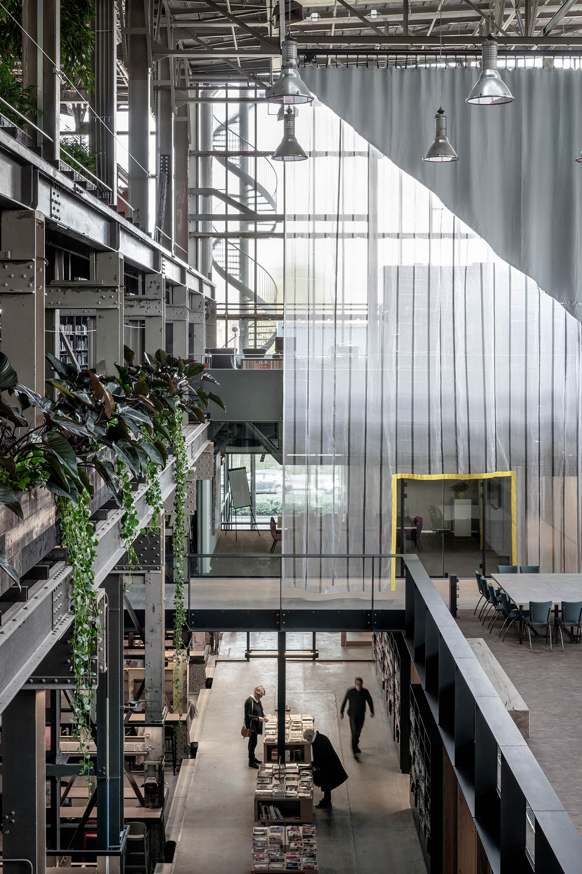 Civic Architects transforms old industrial building into a transparent public library in Tilburg