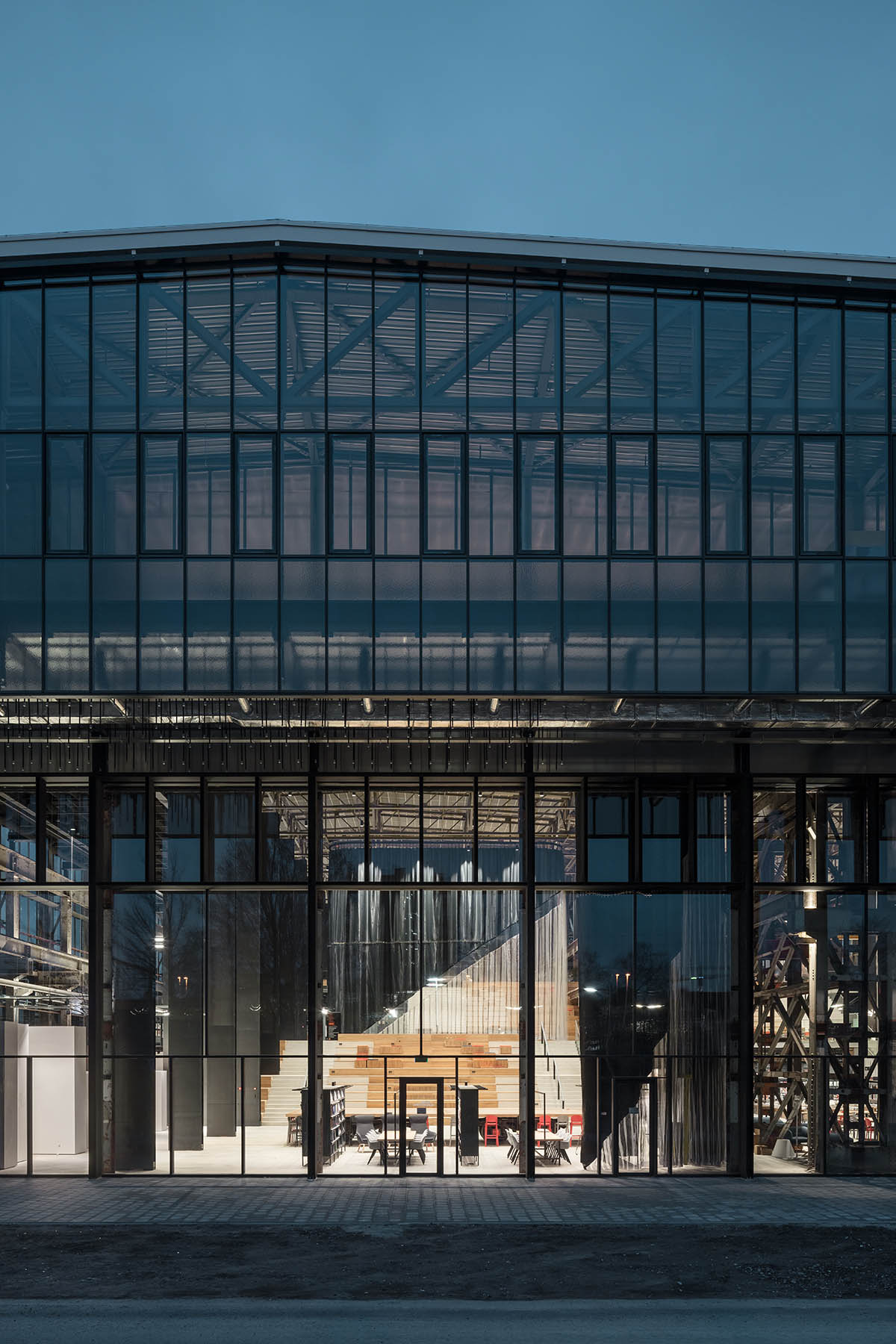 Civic Architects transforms old industrial building into a transparent public library in Tilburg