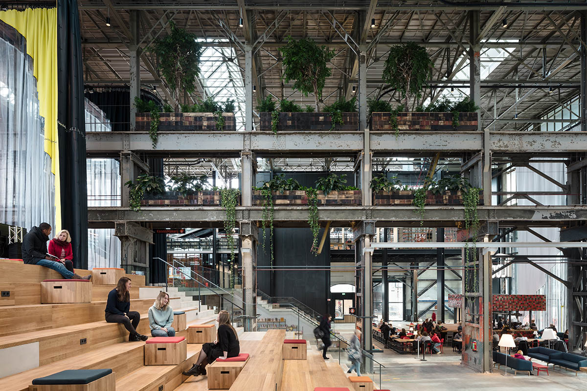 Civic Architects transforms old industrial building into a transparent public library in Tilburg