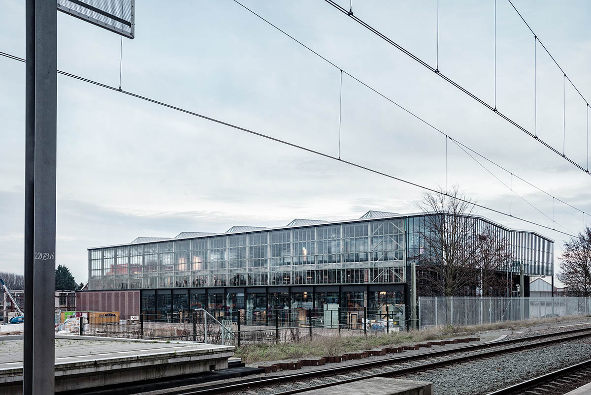 Civic Architects transforms old industrial building into a transparent public library in Tilburg