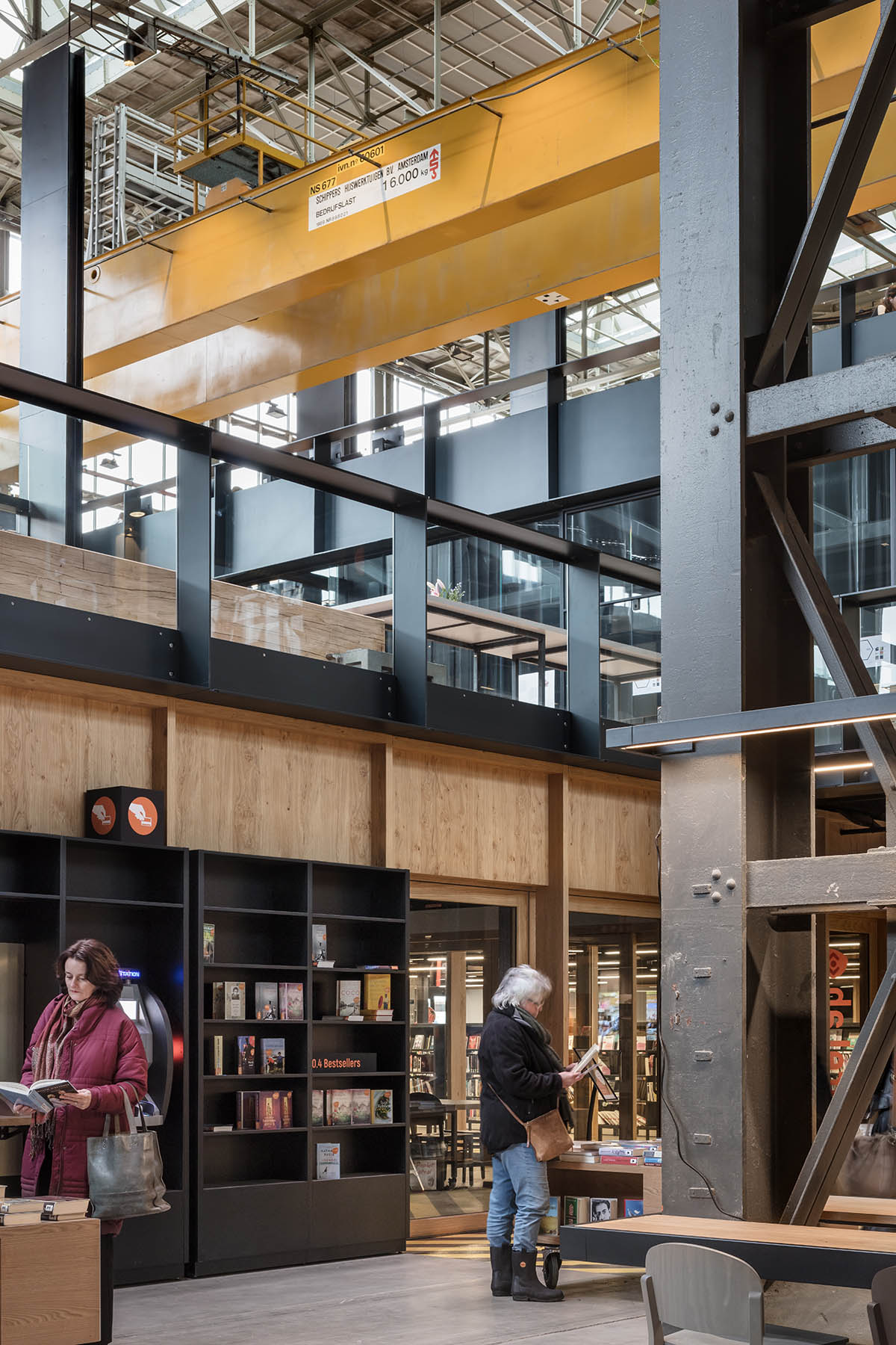 Civic Architects transforms old industrial building into a transparent public library in Tilburg