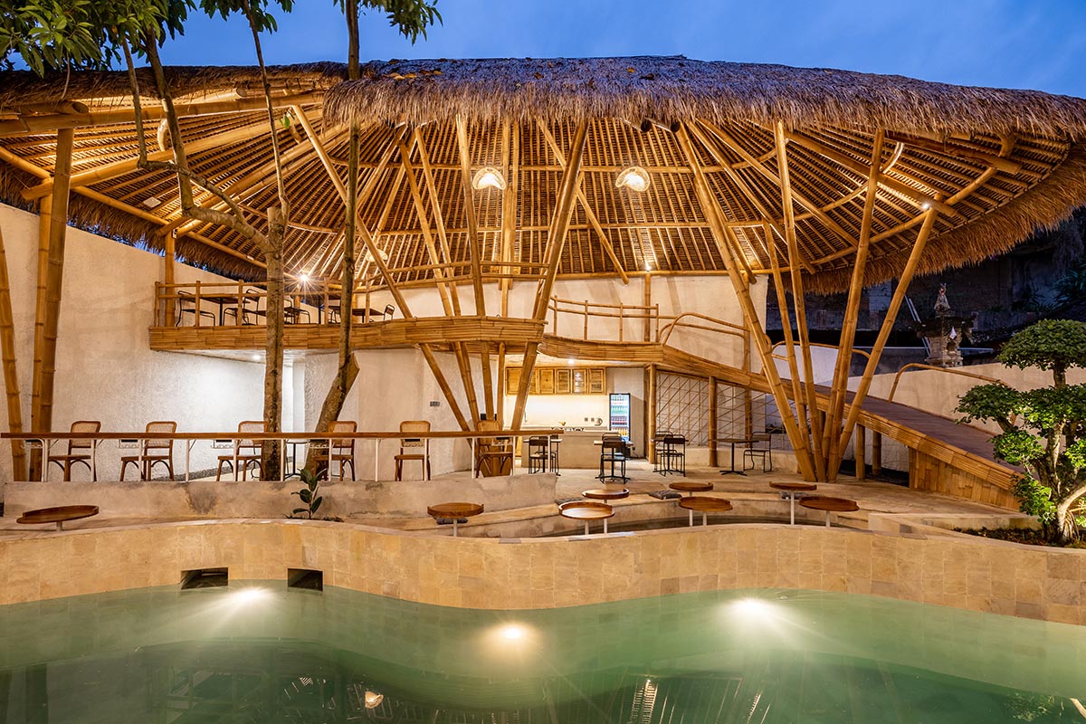 Ruang Nyaman creates intricate facade from arched-bamboo elements for hotel and co-living space