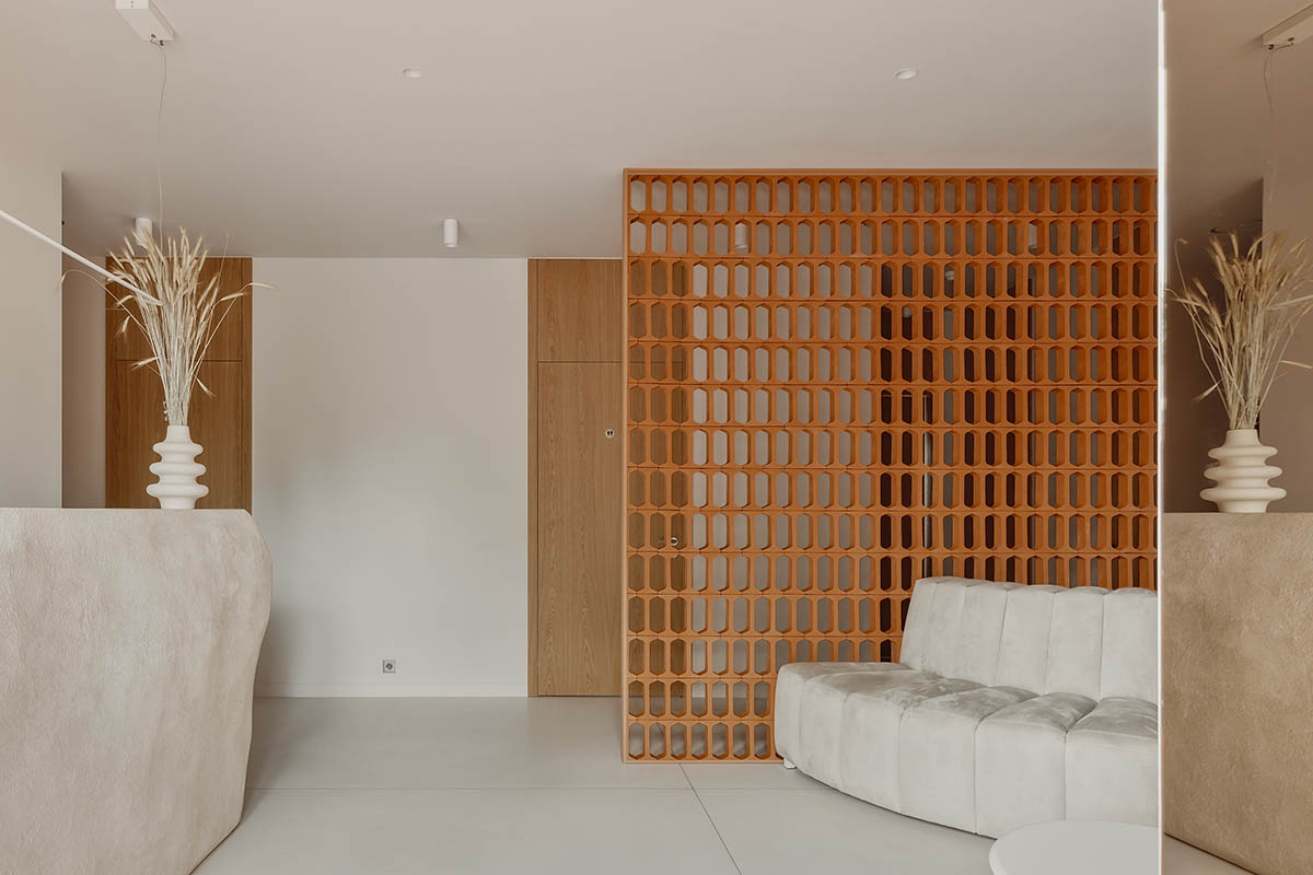 Brise soleil system and clay counter add warmth and depth to dental clinic in Latvia