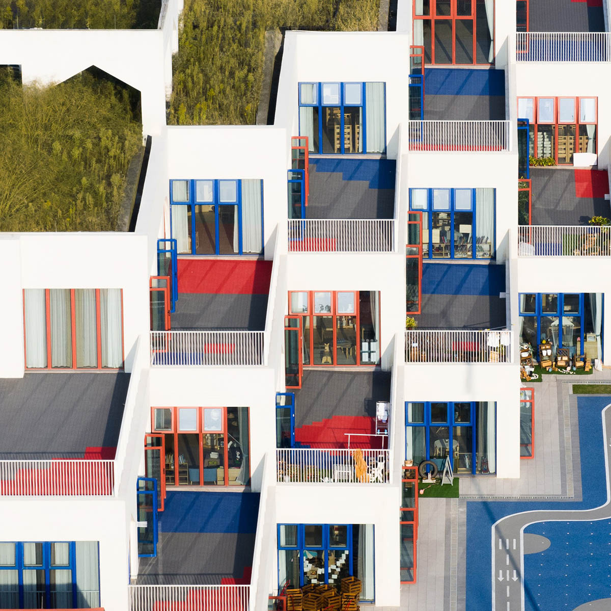 CLOU architects completes kindergarten with white stacked blocks in Liangzhu