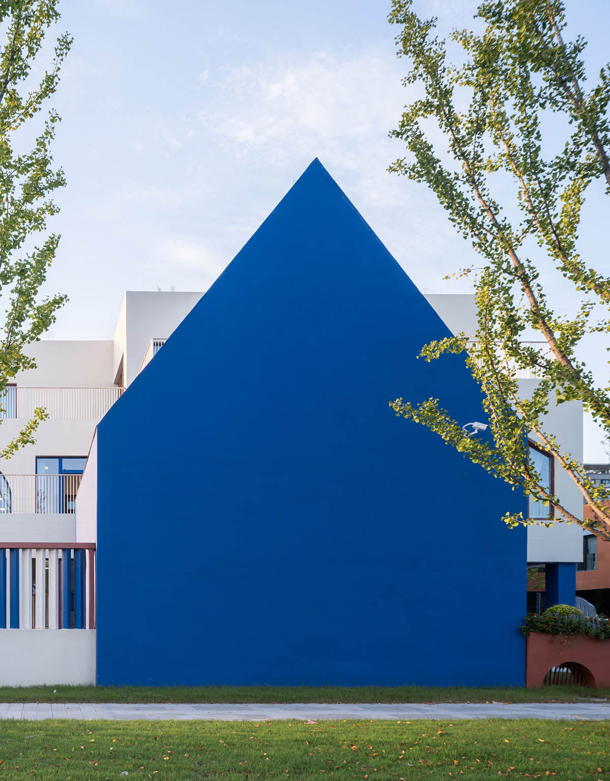 CLOU architects completes kindergarten with white stacked blocks in Liangzhu